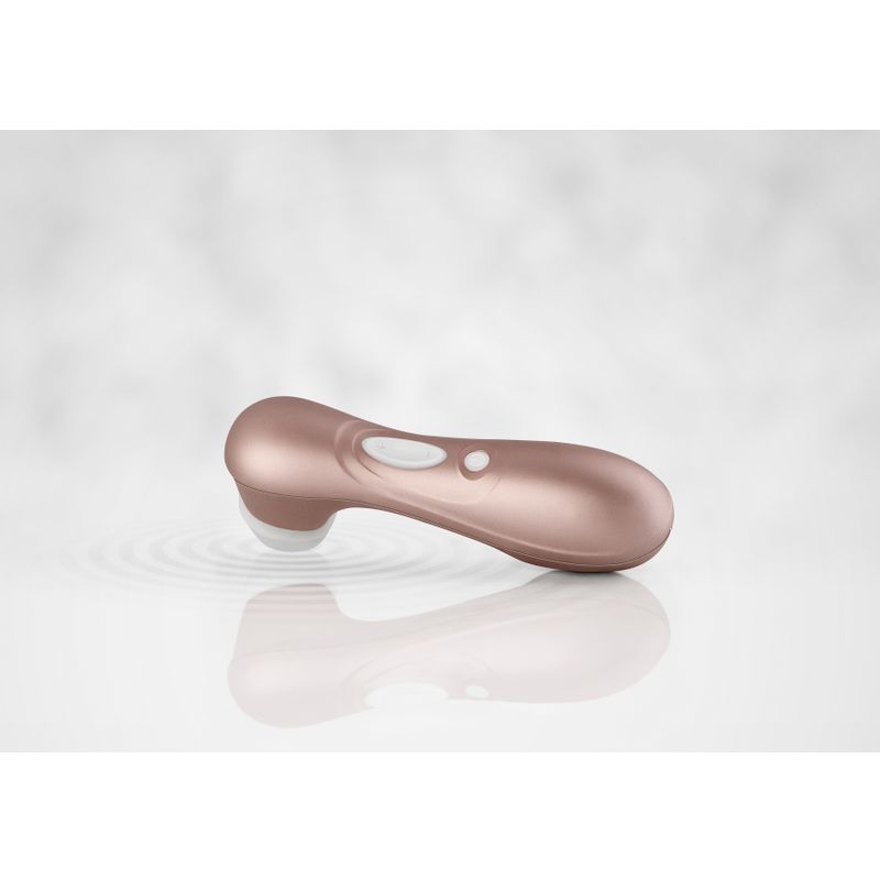 Satisfyer Pro 2 G2 Air Pulse Clitoral Stimulator Rose Gold on sleek reflective surface with gentle waves in background.