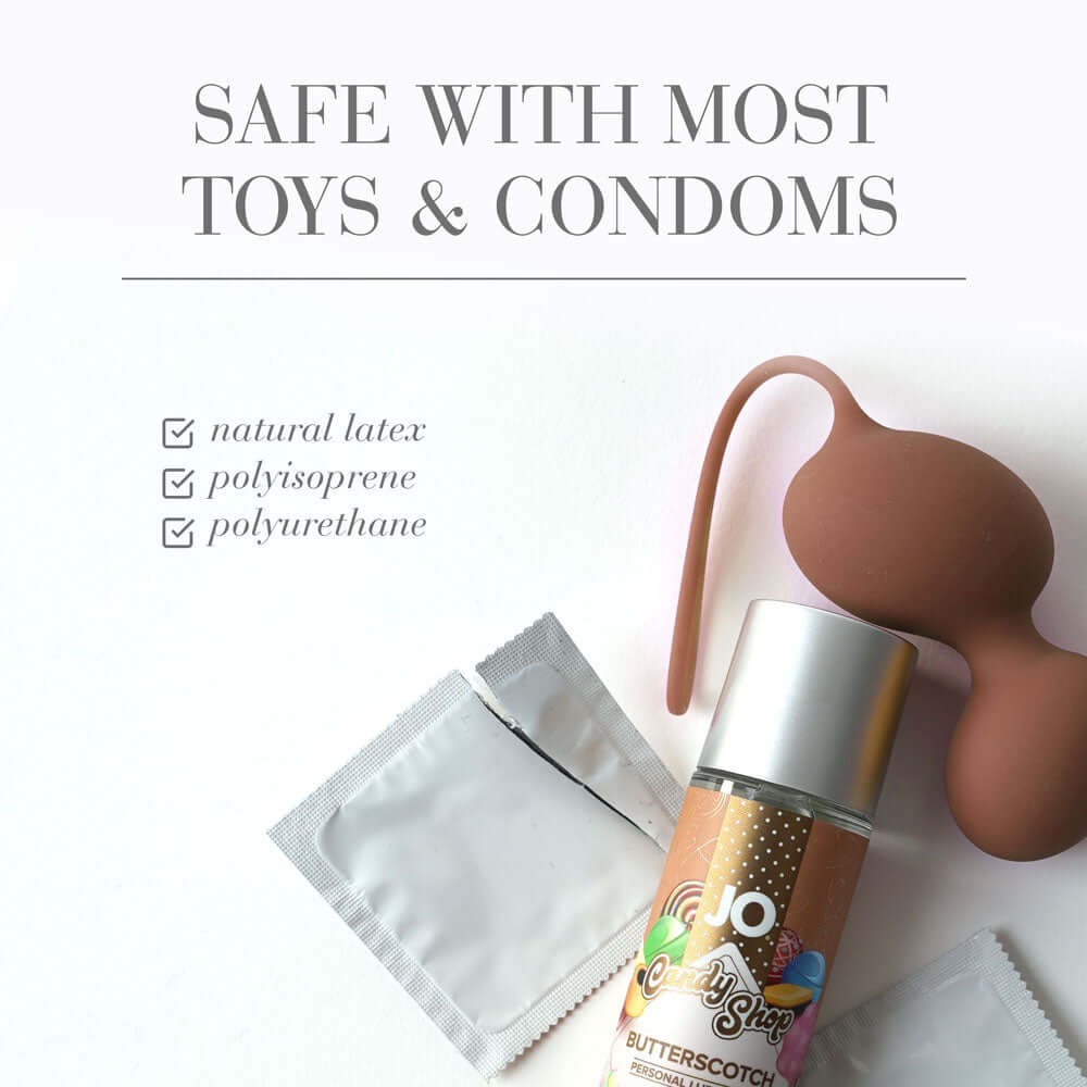 JO Candy Shop Butterscotch Lube with toys and condoms; safe with butterscotch flavored lubricant.