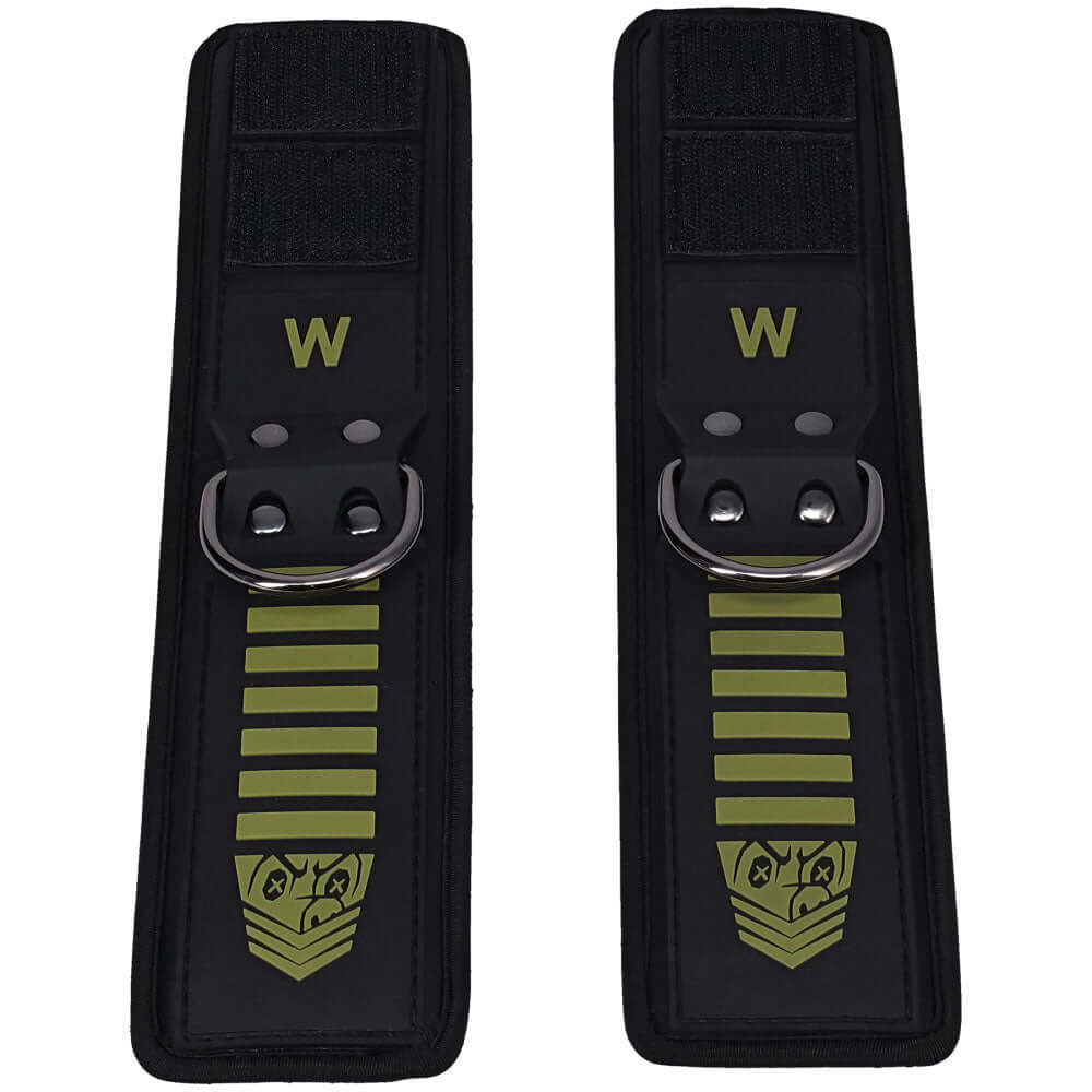 Fort Troff tactical bondage wrist cuffs in black and green with Velcro and D-ring hardware.