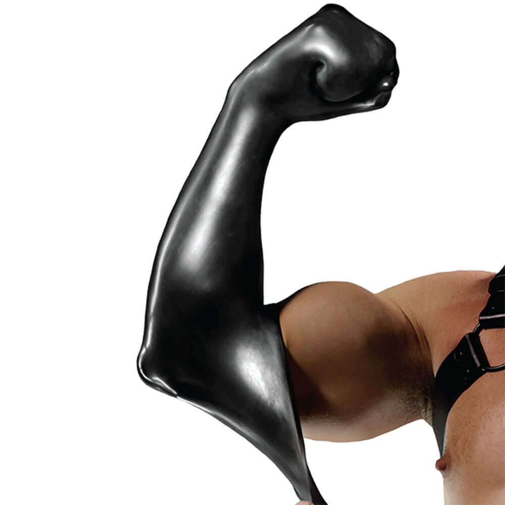 Fort Troff FFister deep pleasure fisting sleeve worn on a muscular arm for enhanced intimate experiences.