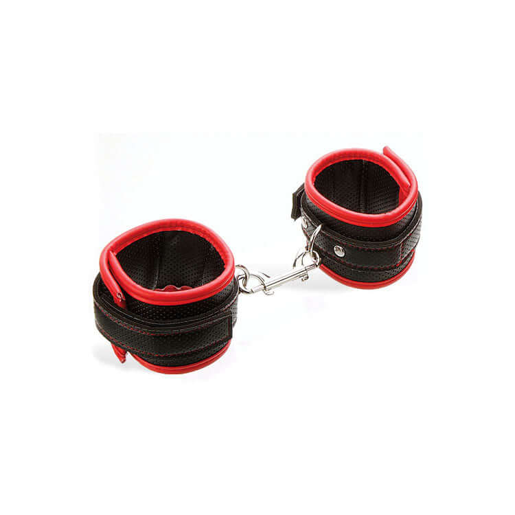 Adam & Eve vegan leather bondage cuffs with red trimming and durable clasps for erotic adventures.