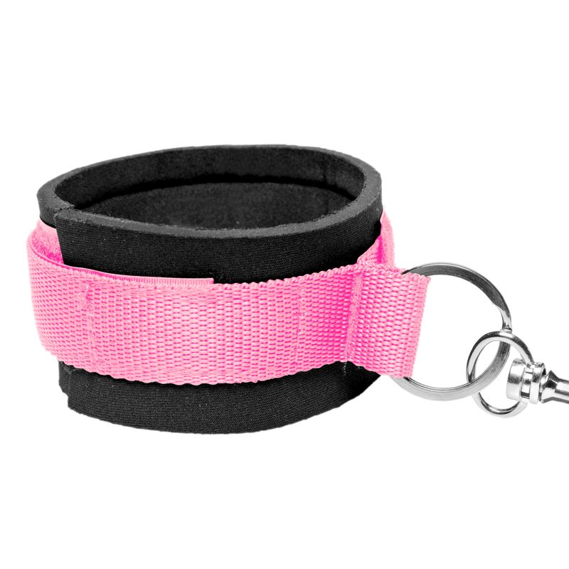 Pink bedroom restraint kit cuff with soft Neoprene lining and heavy-duty Velcro for secure and comfortable restraining.