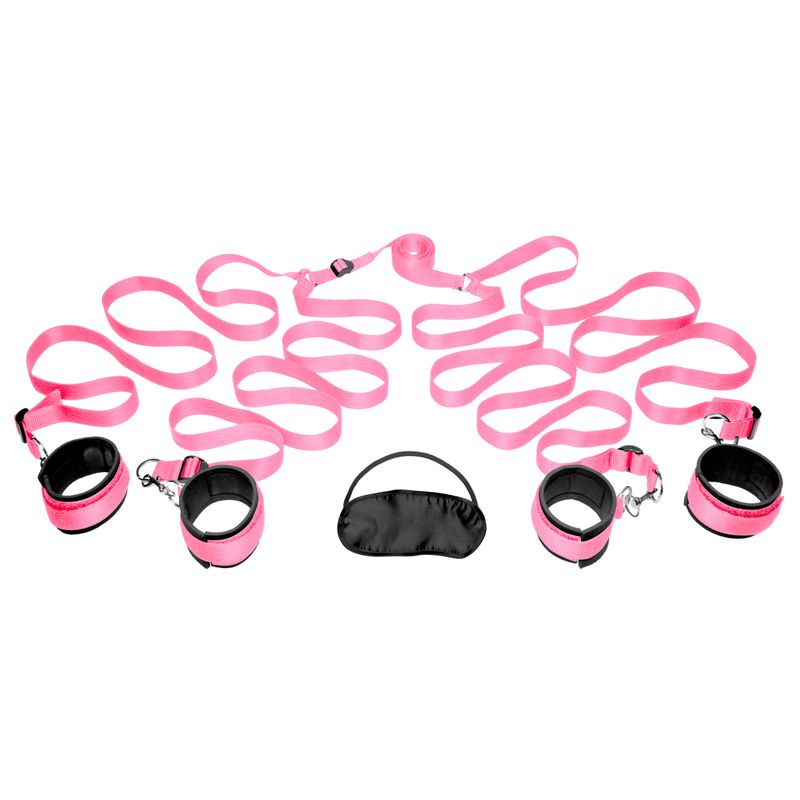 Pink bedroom restraint kit featuring soft neoprene cuffs and adjustable straps for secure bondage play.