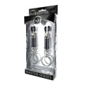 Bondage ring clamps in packaging, featuring adjustable barrel clamps and metal rings for bondage applications.