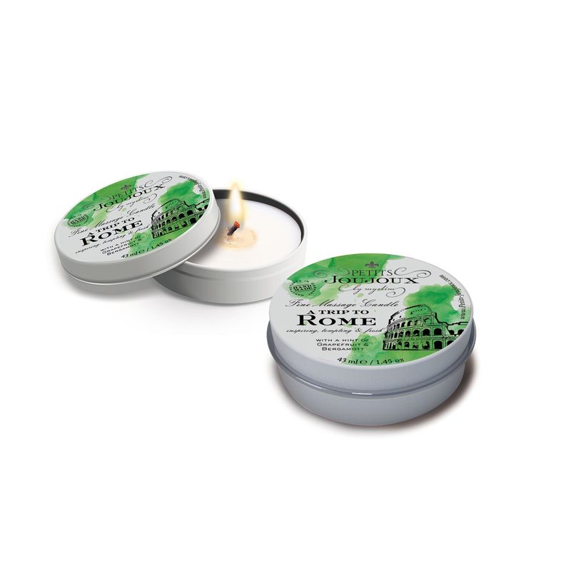 Petits JouJoux Massage Candle Rome 43ml, a massage candle with grapefruit and bergamot, lit and ready to use.