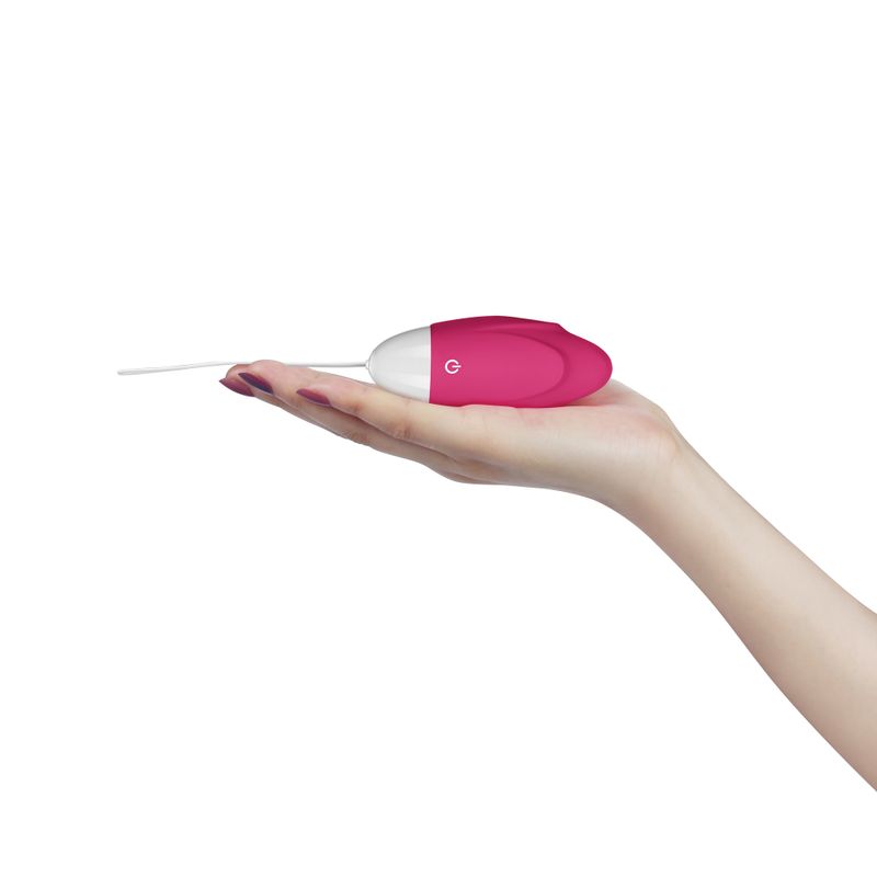 IJOY wireless remote control rechargeable egg in a hand showcasing its sleek design and colors.