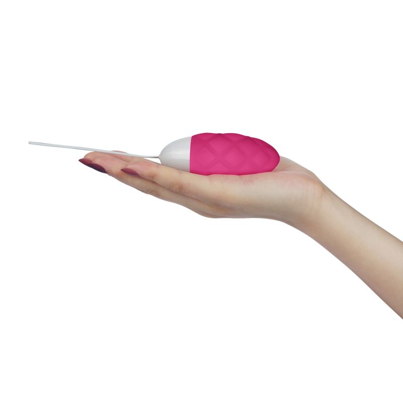 IJOY wireless remote control rechargeable egg held in hand, featuring silken silicone finish and sleek design.