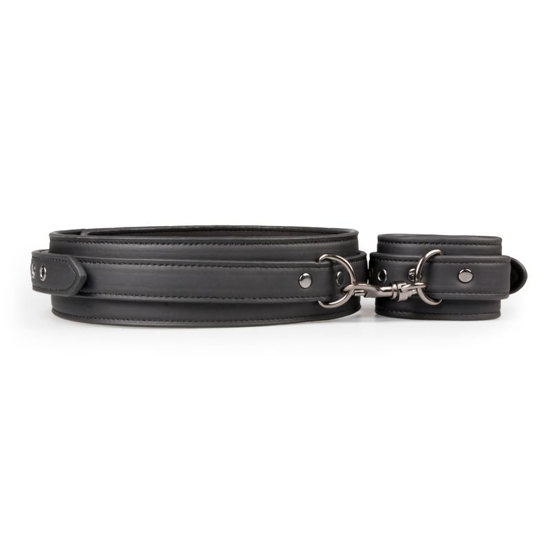 BDSM thigh and wrist cuff set featuring durable faux leather cuffs with clip fasteners for bondage control.