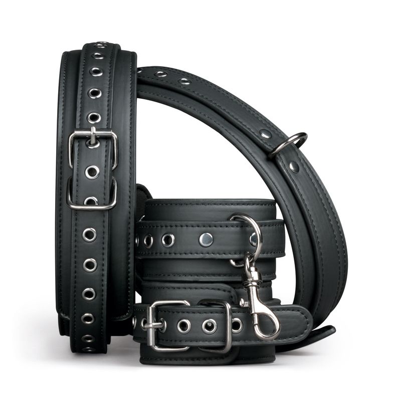 Thigh and Wrist Cuff Set made of durable faux leather with foam lining for comfort, ideal for BDSM play.
