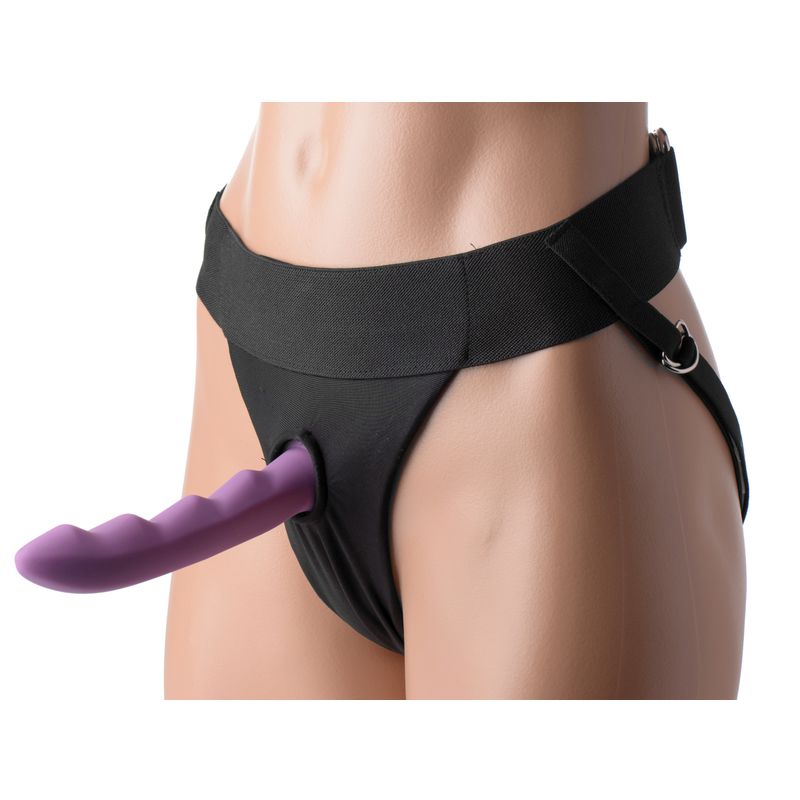 Avalon jock style strap on harness with adjustable straps and a purple dildo.