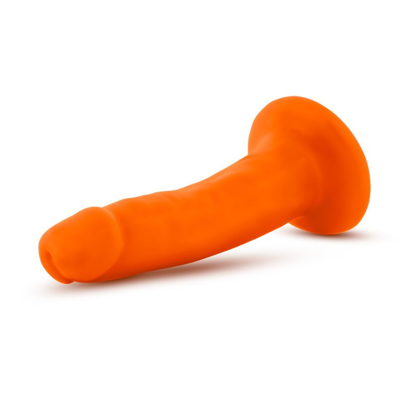 Neo Dual Density Cock 6in in neon orange color, featuring a suction cup base for versatile use and ultra realistic feel.
