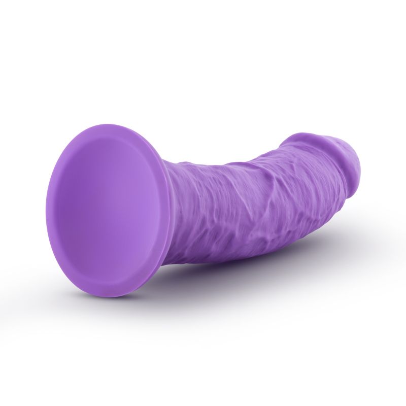 Girthy silicone dildo in purple with a curved shaft and deep suction cup base for versatile pleasure.
