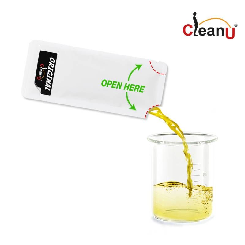 CleanUrin synthetic urine for discreet use being poured from a sachet into a measuring beaker.