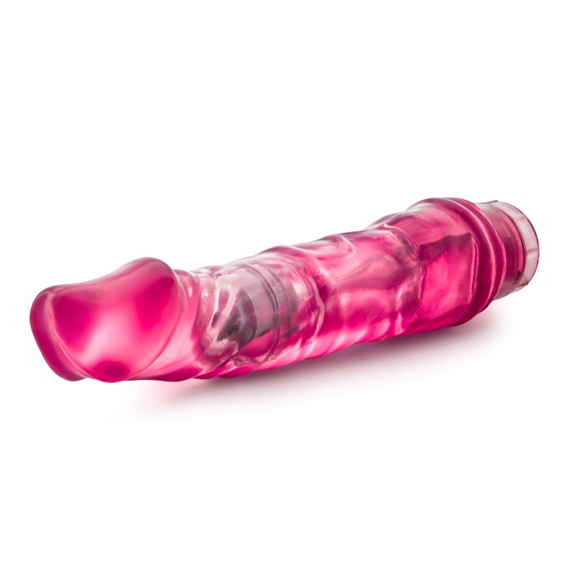 B Yours Vibe 6 pink realistic waterproof vibrator with prominent head and smooth textured design.
