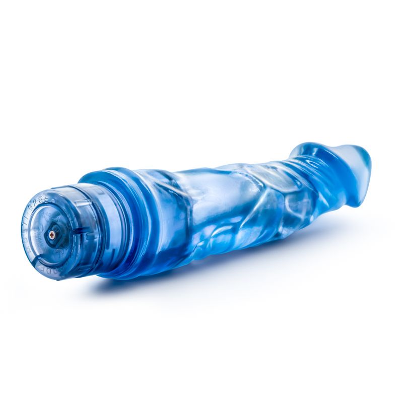 B Yours Vibe 6 blue realistic waterproof vibrator with a prominent head and twist dial base for multispeed vibrations.