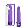 Luxe Purity Purple silicone erotic massager in packaging showcasing its sensual design and features.