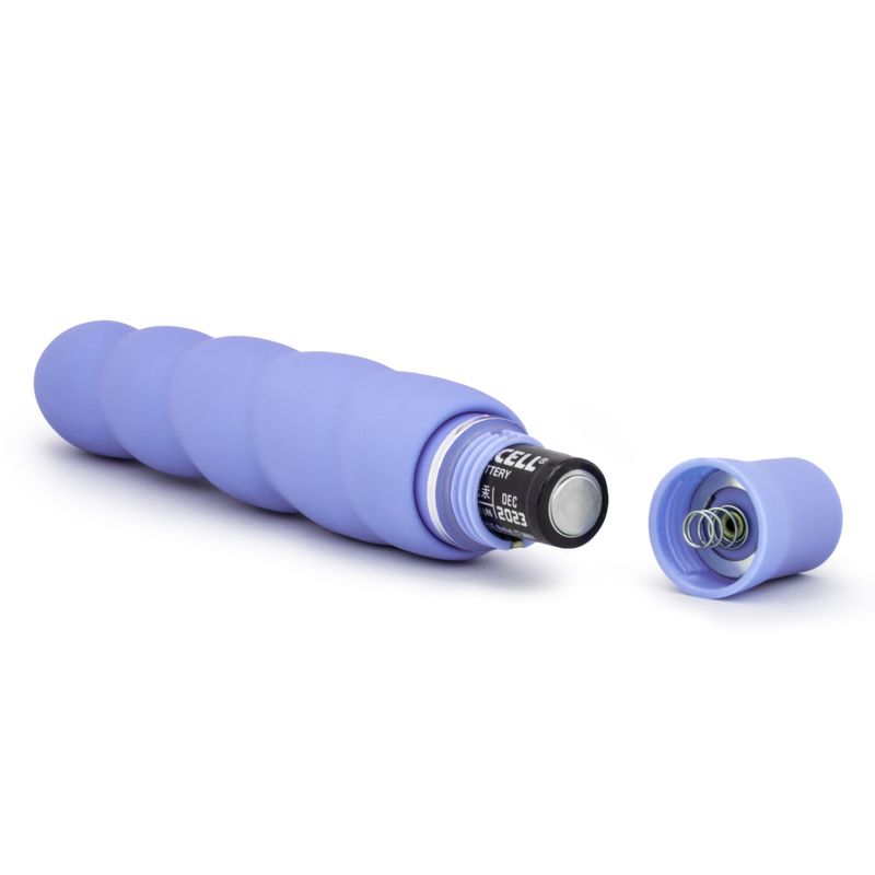 Luxe Anastasia vibrating toy in periwinkle color, featuring smooth silicone finish and battery compartment.