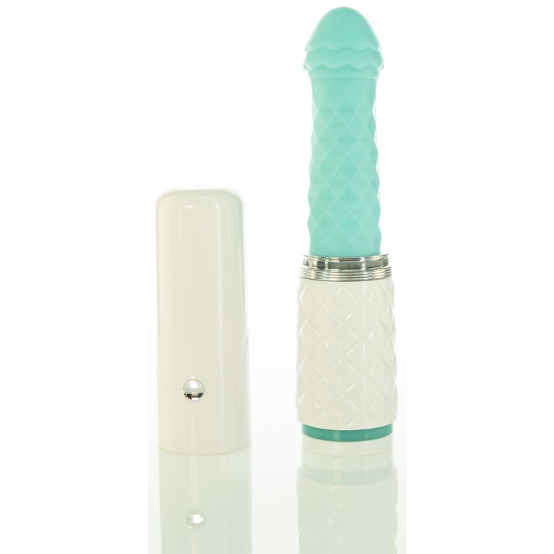 Pillow Talk thrusting vibrator in teal with a diamond pattern handle, perfect for unique and pleasurable experiences.