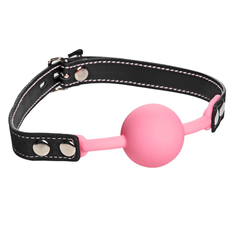 Glow in the dark ball gag in pink silicone and black strap with adjustable buckle.