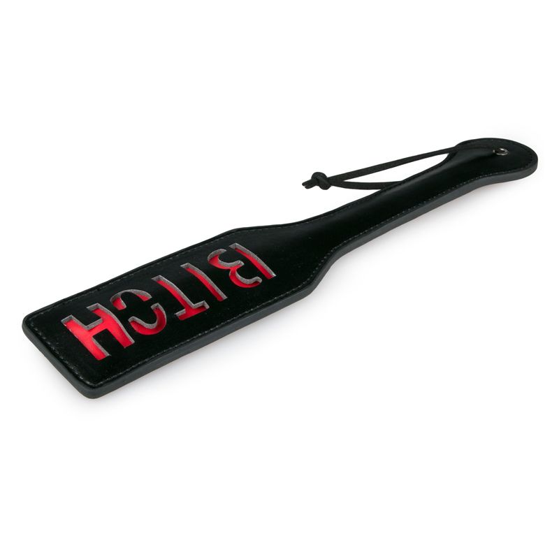 Paddle Bitch Black, a sexy paddle with red inscription, perfect for playful punishment in intimate settings.