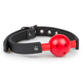 PVC ball gag for bondage with adjustable faux leather strap and a vibrant red ball.
