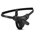 Silicone strap-on harness featuring adjustable straps and a compact silicone dildo for intimate sessions.