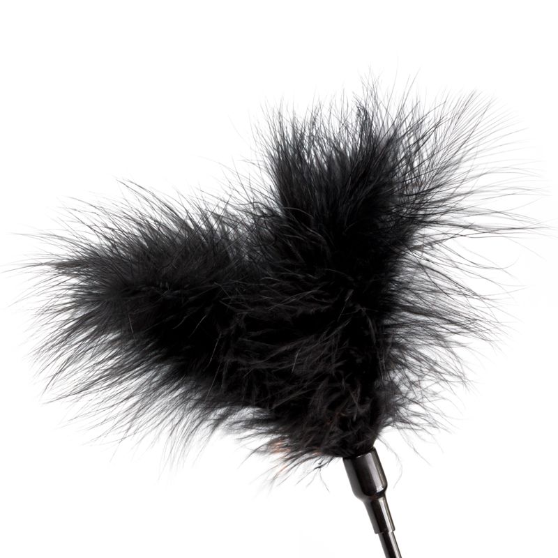 Close-up of a black tickler from the Beginners Bondage Fantasy Kit, perfect for adding fun to intimate essentials.