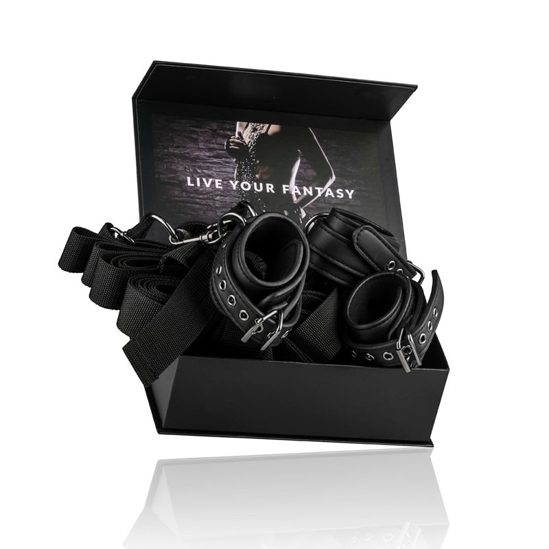 Under Mattress Restraint Set in a stylish box with adjustable straps and cuffs for bondage adventures.