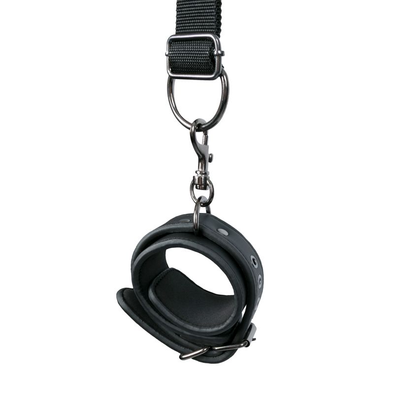 Under Mattress Restraint Set displayed, featuring a black cuff attached to a strap for bondage play.