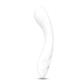 Flexible silicone vibrator in elegant white design, showcasing smooth and soft silicone material with a curvy shape.