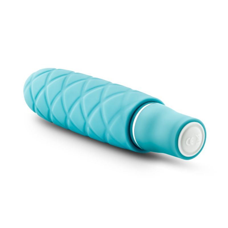 Luxe Cozi Mini Aqua, a mini silicone vibrator with a smooth design and multiple vibrating functions.