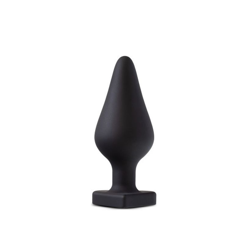 Temptasia Fuck Me Butt Plug in black, made of flexible silicone, tapered design for easy insertion, heart-shaped base.