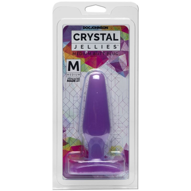 Medium purple butt plug in packaging, featuring a smooth tapered design and flared base for safety.