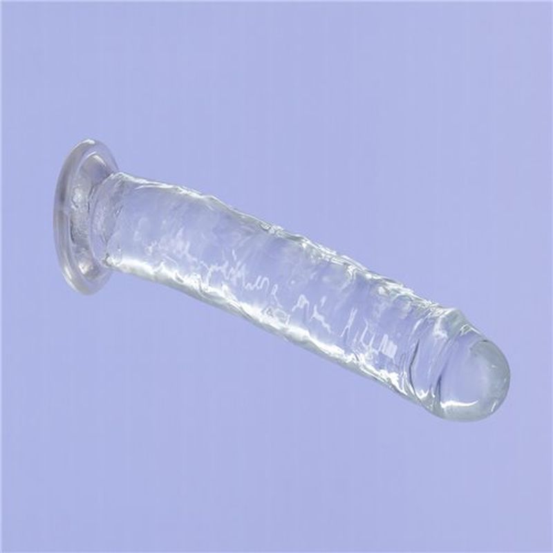 7 inch crystal dildo in transparent design with suction base for versatile use.