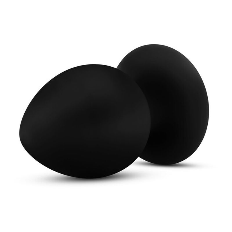 Large silicone anal plug in sleek black design, perfect for exploring anal sensations and stretching.