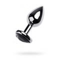 Small silver anal plug with tourmaline gem, featuring a sleek design and polished finish, ideal for pleasure.