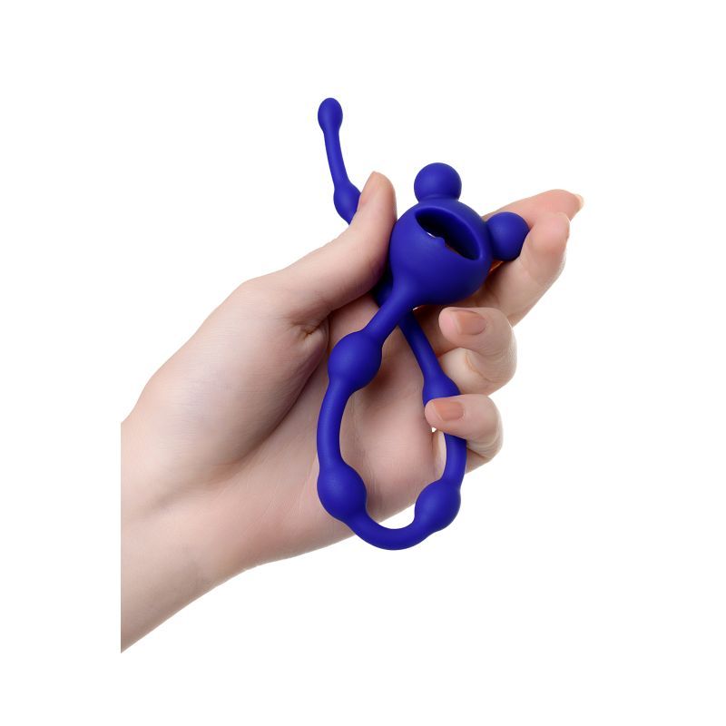 Hand holding a ToDo Froggy anal chain in navy blue silicone, featuring miniature beads for flexible use.