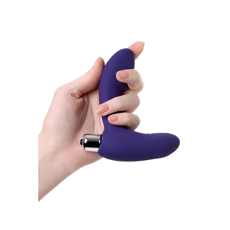 Hand holding the ToDo Bruman Vibrating Prostate Stim, a silicone vibrating prostate stimulator in violet color.