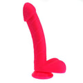 Realistic pink dildo with suction base, featuring textured design and bottom support for stability.