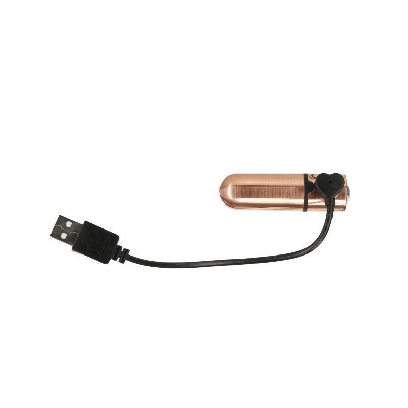 Rechargeable rose gold bullet vibrator with USB charging cable and sleek design.