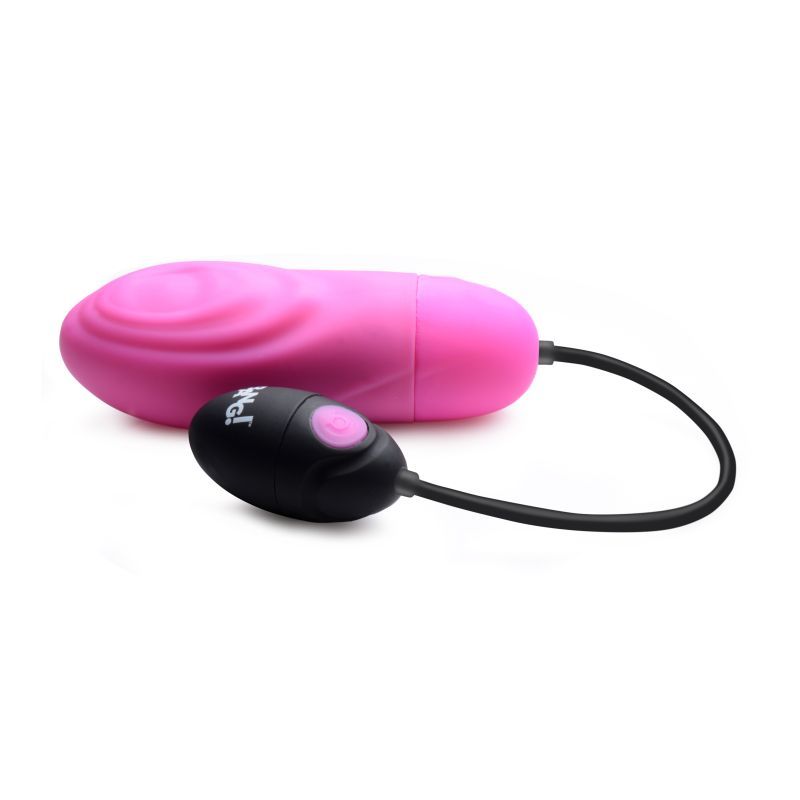 7X pulsing rechargeable bullet vibrator in pink with remote control and retrieval cord for G-spot and clitoral stimulation.