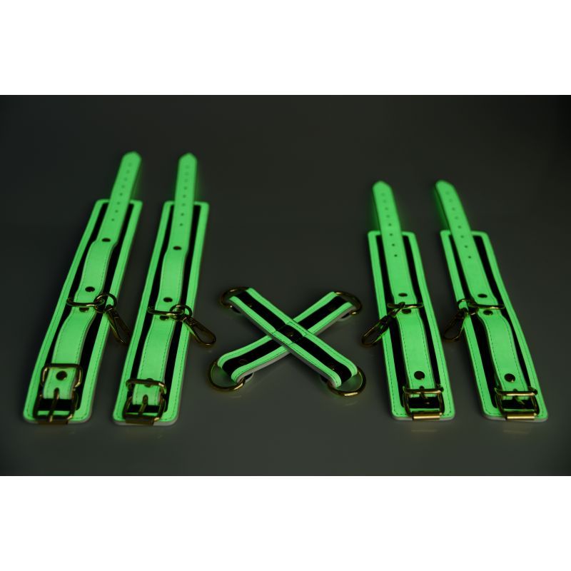 glowing hog tie bondage set featuring fluro green adjustable cuffs and golden metal hardware for bedroom fun