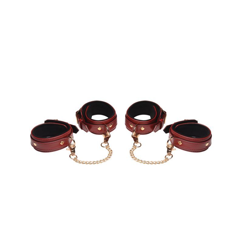 Burgundy PU leather bondage set with stylish restraints and gold accents.