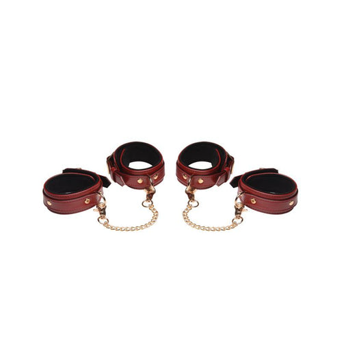 Burgundy PU leather bondage set with stylish restraints and gold accents.