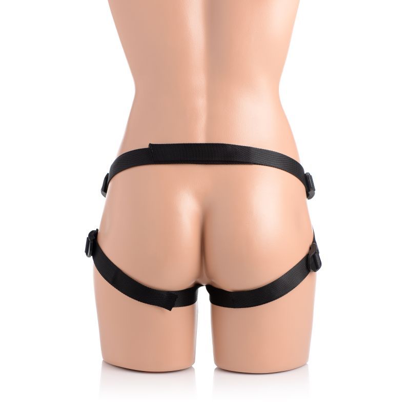 Back view of a mannequin wearing an adjustable harness for a silicone dildo with harness.