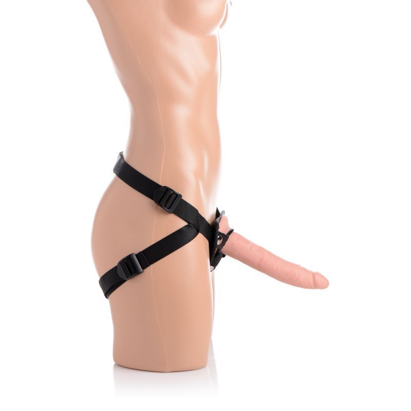 Charmed 7.5in Silicone Dildo w Harness Flesh displayed on a mannequin with an adjustable harness.