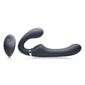 Mighty Rider 10X Strapless Strap-On Black w Remote showcasing a sleek design and a wireless remote for versatile use.