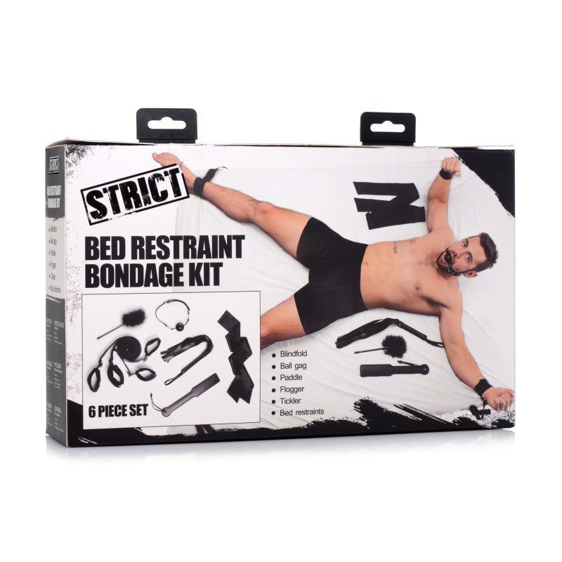 Bed Restraint Bondage Kit Black complete with paddle, flogger, gag, and restraints for BDSM play.