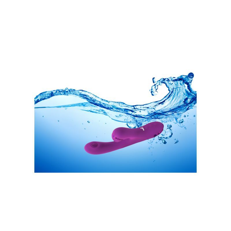 Viben Dazzle rechargeable thumping rabbit vibrator swimming in water with splashes.
