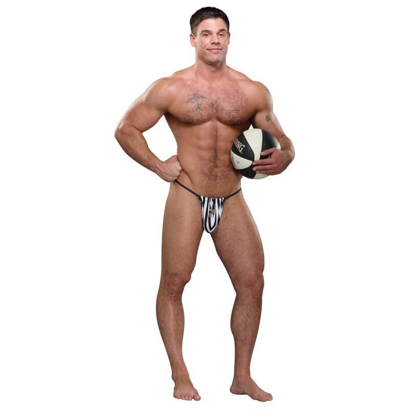 Model wearing Referee Novelty G-String Black, holding a football, showcasing comfort fit and stylish design